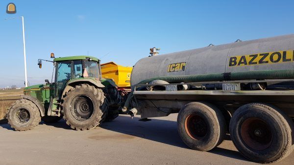 Tractor met waterwagen