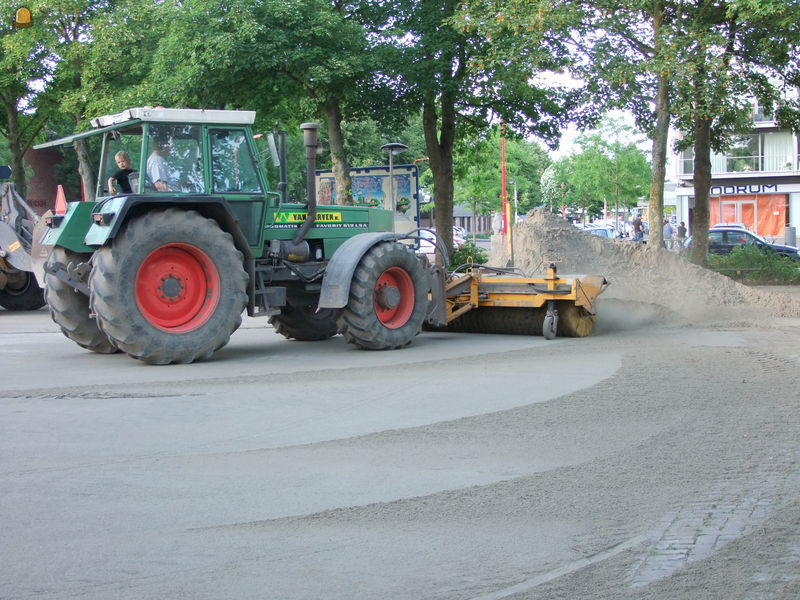 Trekker met rolbezem