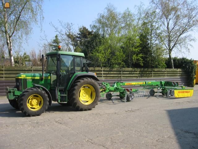 John Deere   6110 met rugger