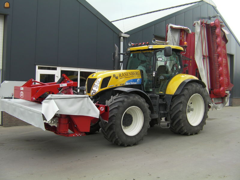 New holland T 7040 met Lely 900MC