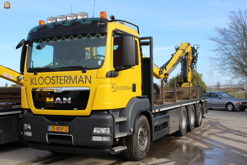 MAN 8x4 rijplaatauto