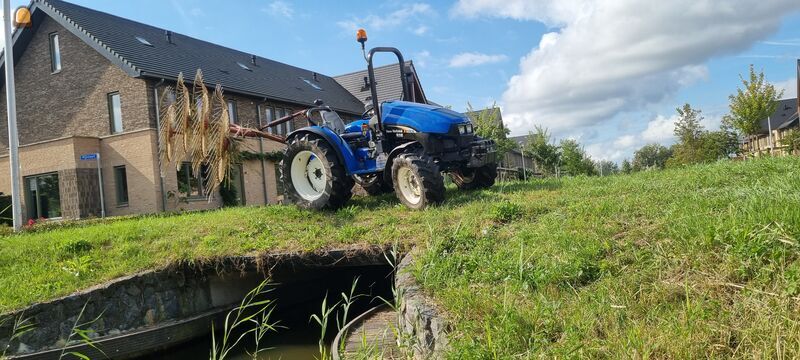 New holland met acrobaat