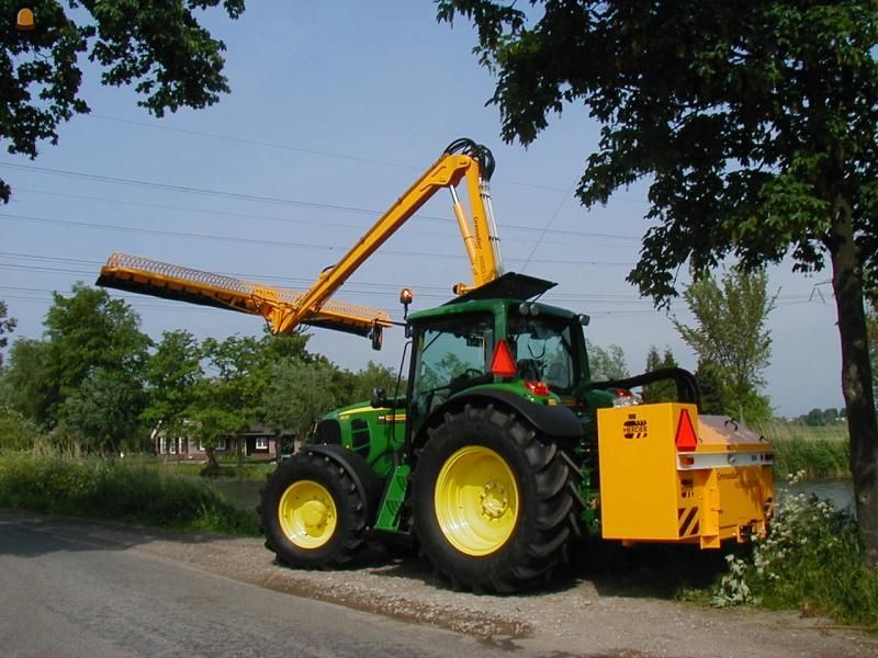 John Deere met herder