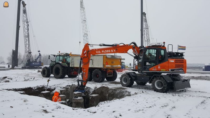 Doosan DX140-5 met draaikantelstuk