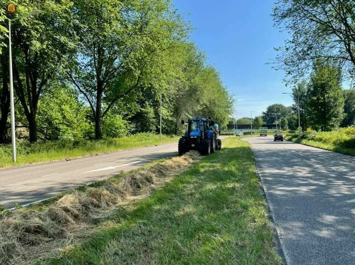 Tractor met McHale oprolpers